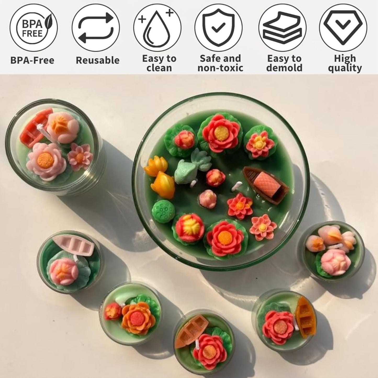 Multiple finished lotus pond container candles showing BPA-free reusable mould results with colourful floral embeds