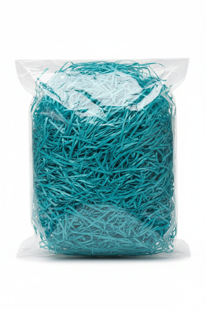 Sky blue cyan shredded wooden gift box filler in a clear bag