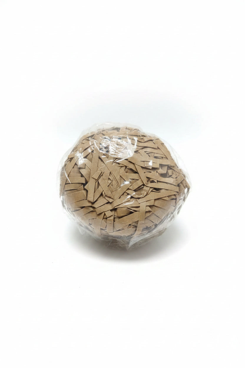 Brown kraft shredded paper gift box filler in a clear bag