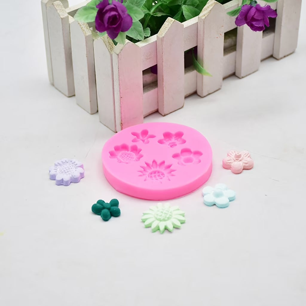 Mixed Flower Silicone Mold – lifestyle shot with colourful flower castings