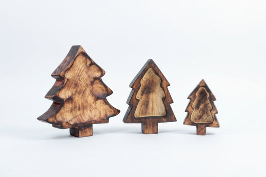 Christmas tree shaped wooden bases for festive candle making and decor