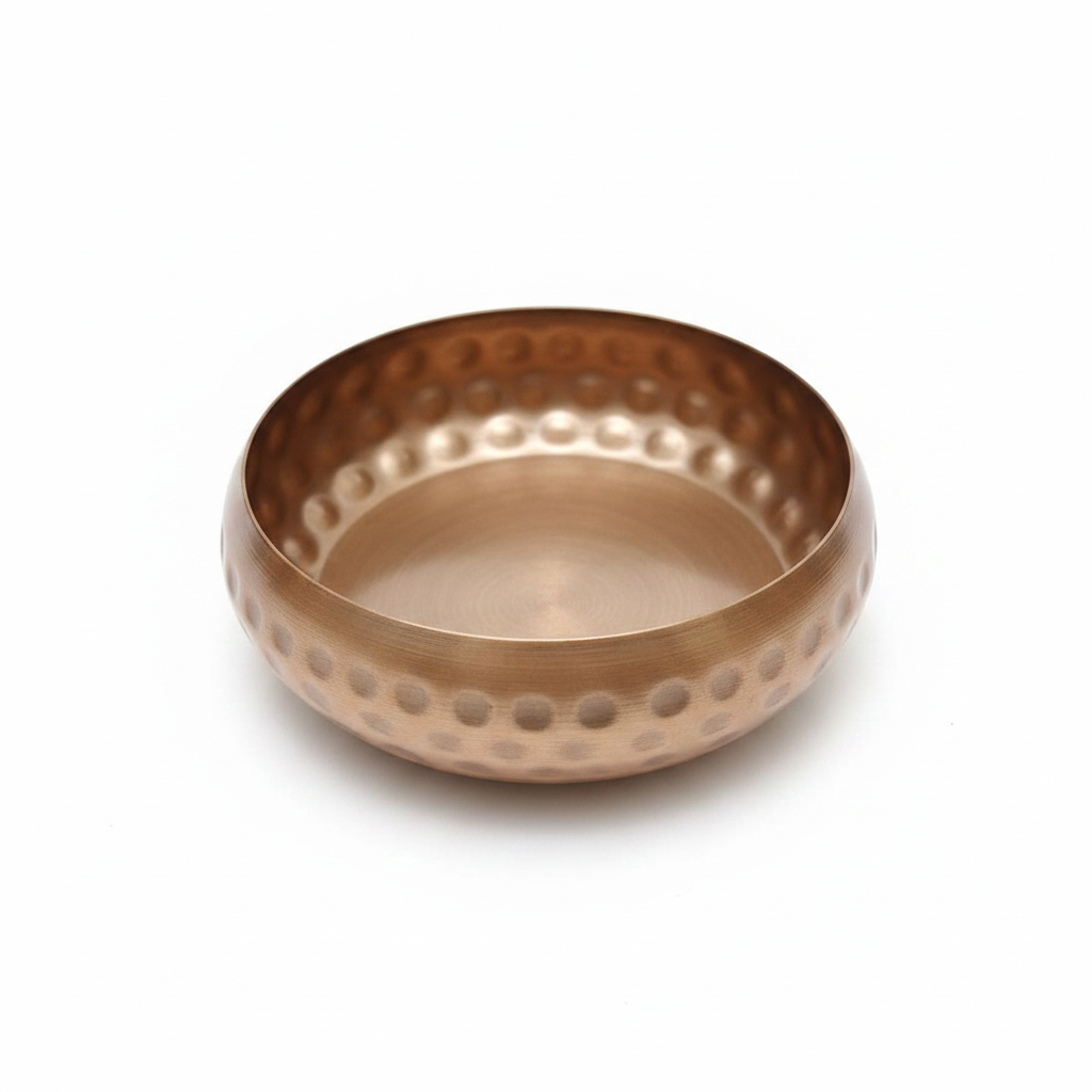 Hammered copper gold round bowl candle vessel, 5 inch, angled view
