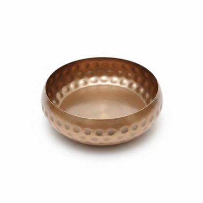 Hammered copper gold round bowl candle vessel, 5 inch, angled view