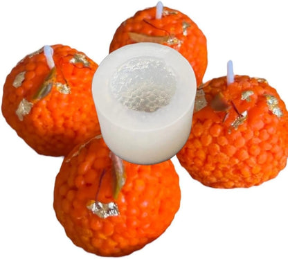 Laddu candles in cupcake liners on a decorative plate for Diwali