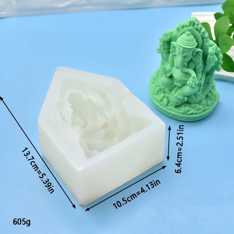 Ganesha silicone mould with dimensions: 13.7x10.5x6.4cm, weight 605g, with finished green Ganesha