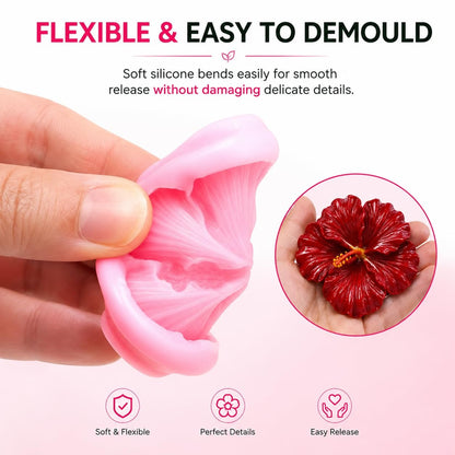 Two pink hibiscus flower silicone candle molds with finished candle