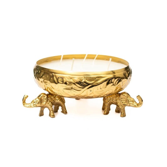 Gold embossed elephant urli candle vessel with lotus floral etching and elephant figurine legs on white background