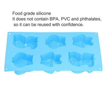 Close-up of blue silicone mould showing detailed owl and squirrel cavities