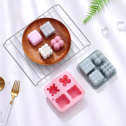 4-in-1 Bubble Cube Cross Floral Silicone Candle Mould – Assorted Shape Multi-Design Cast ₹200