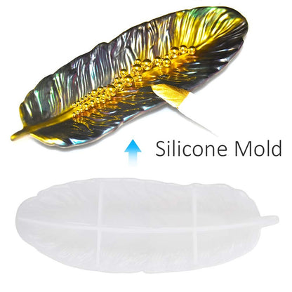 Feather silicone mold with iridescent resin casting and gold beads