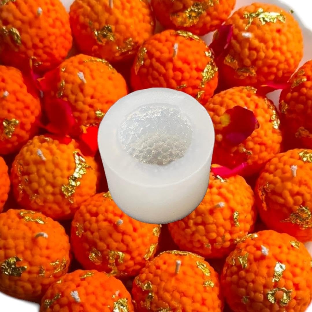 Laddu candles displayed in festive Diwali setting