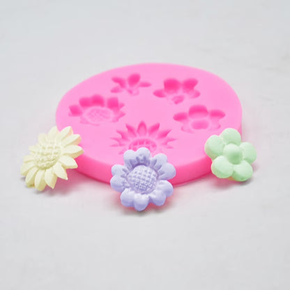 Mixed Flower Silicone Mold – 3 flower castings in pastel colours on white background