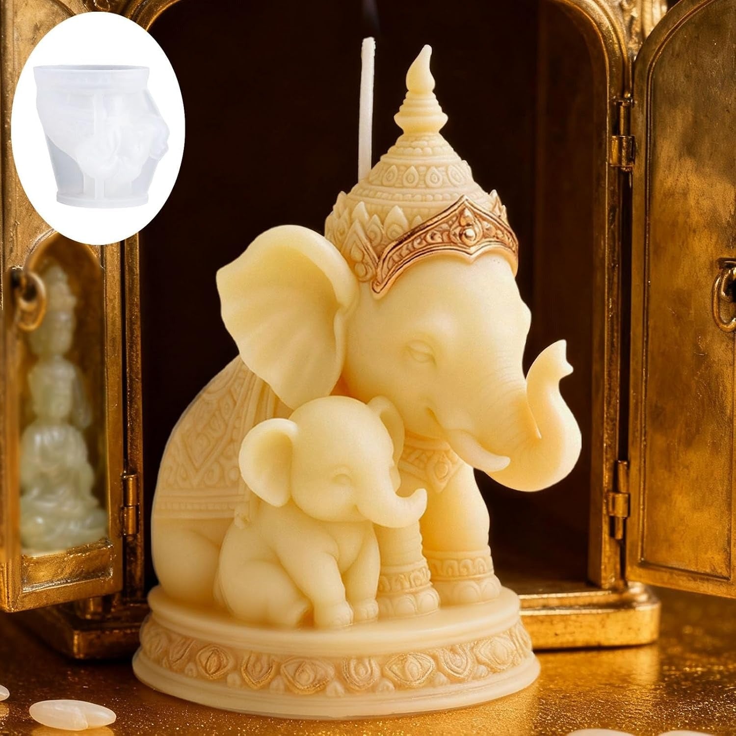 White silicone elephant and baby mould beside finished wax candle cast on white background