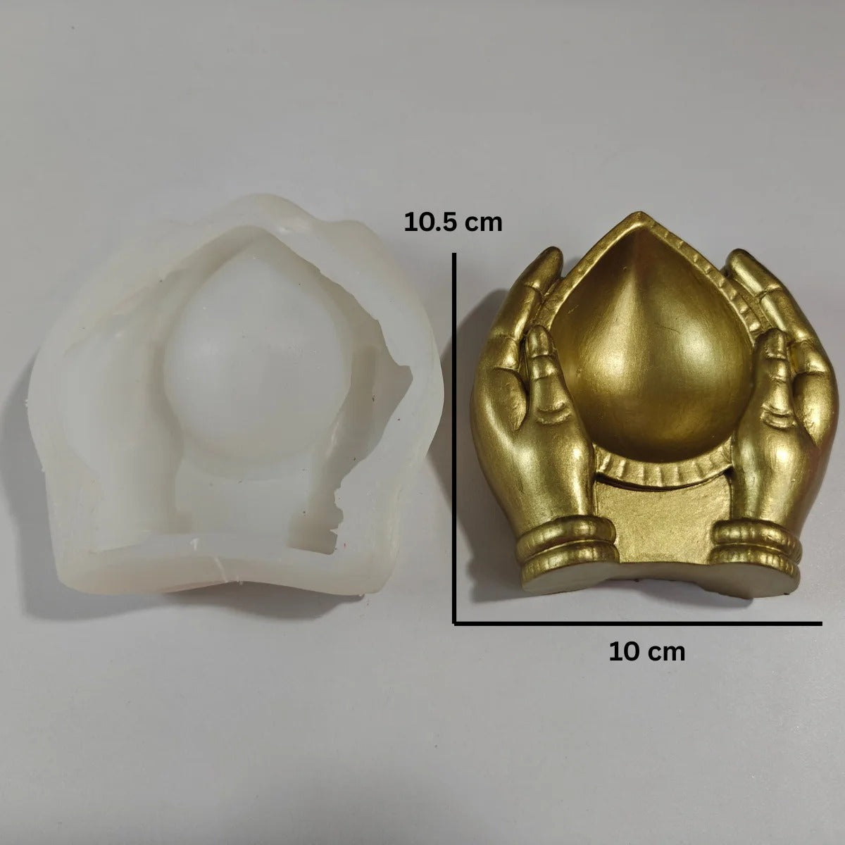 Arpan Diya Silicone Mould – pink mould with gold finished diya casting, size 10.5x10cm