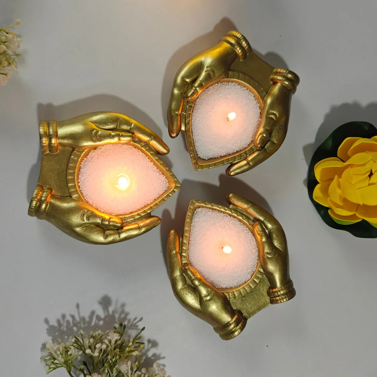 Arpan Diya Mould – gold finished diya holder, top angle view