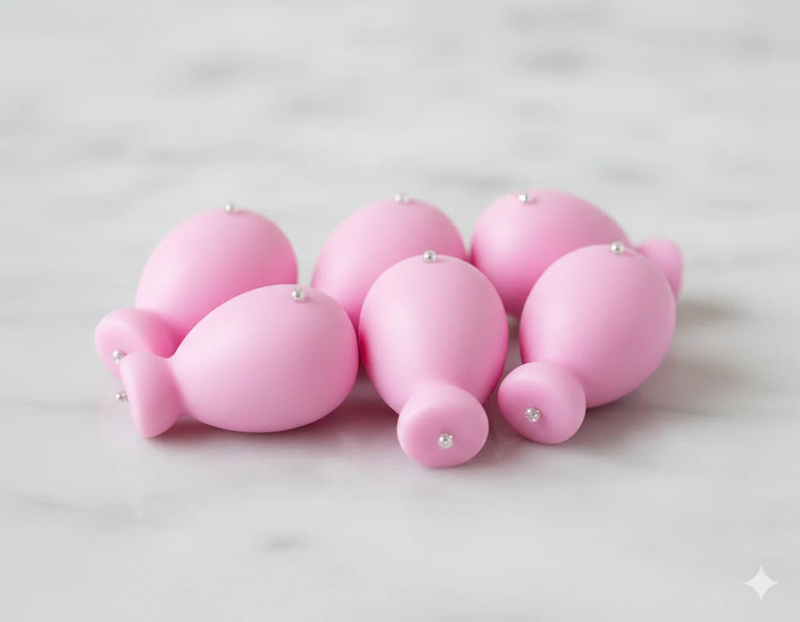 Round white silicone mould with 7 balloon cavities viewed from above