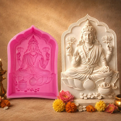 Pink silicone Goddess Lakshmi candle mould with white plaster cast sample, Diwali setting