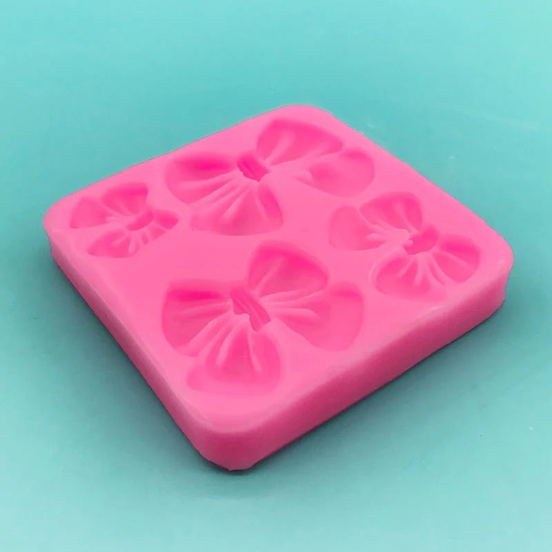 Bloom Creations bow fondant silicone mold for cake, chocolate, and candle decoration