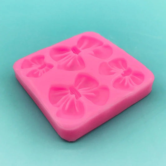 Bloom Creations bow fondant silicone mold for cake, chocolate, and candle decoration