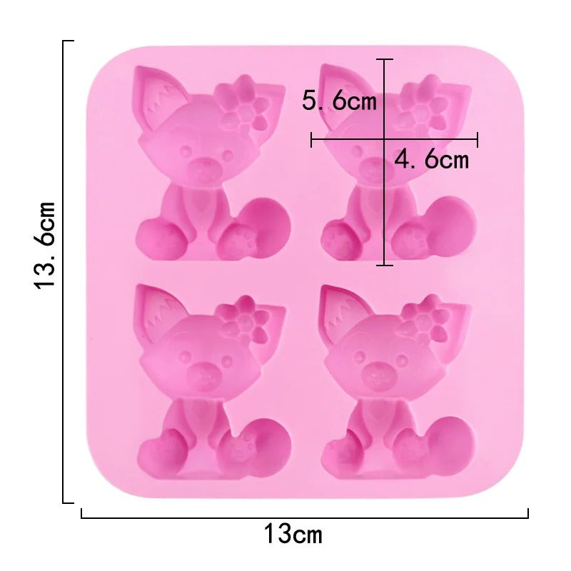 Pink 4-cavity cute cat silicone mould with dimensions: 13x13.6cm mould, 5.6x4.6cm cavity