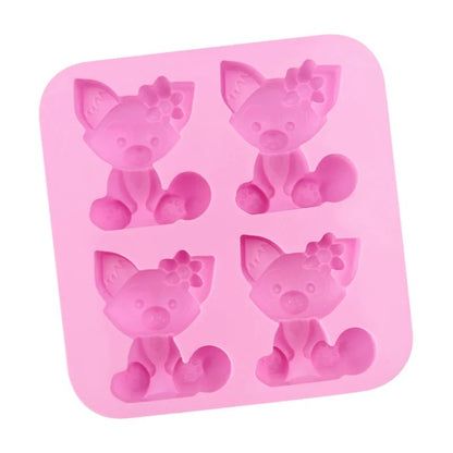 Pink 4-cavity cute cat silicone mould top view showing detailed sitting cat design