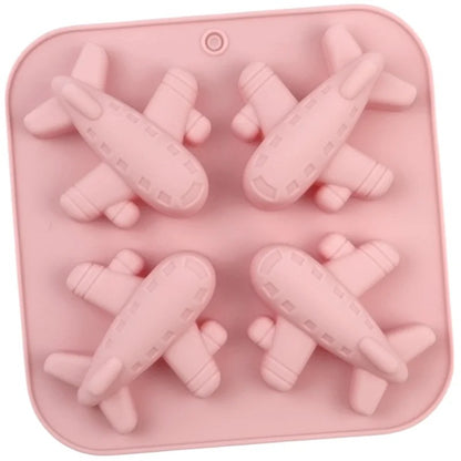Pink airplane silicone mould showing cavity detail from above