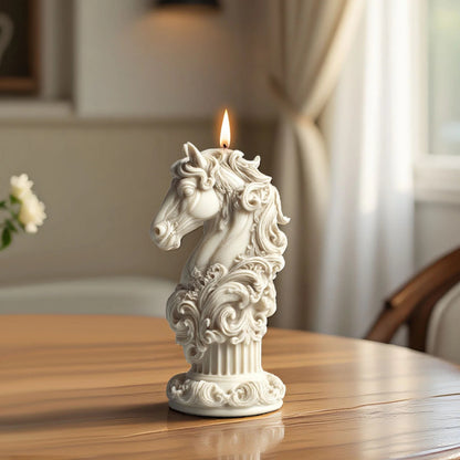Finished horse-head sample candle with flowing mane and decorative pedestal on a wooden table; candle not included