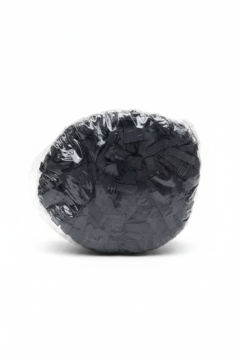 Black shredded paper gift box filler in a clear bag