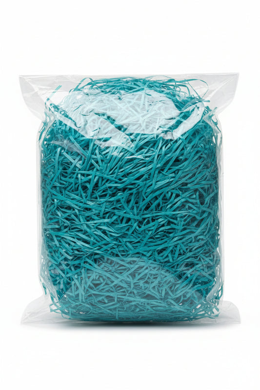 Sky blue cyan shredded wooden gift box filler in a clear bag