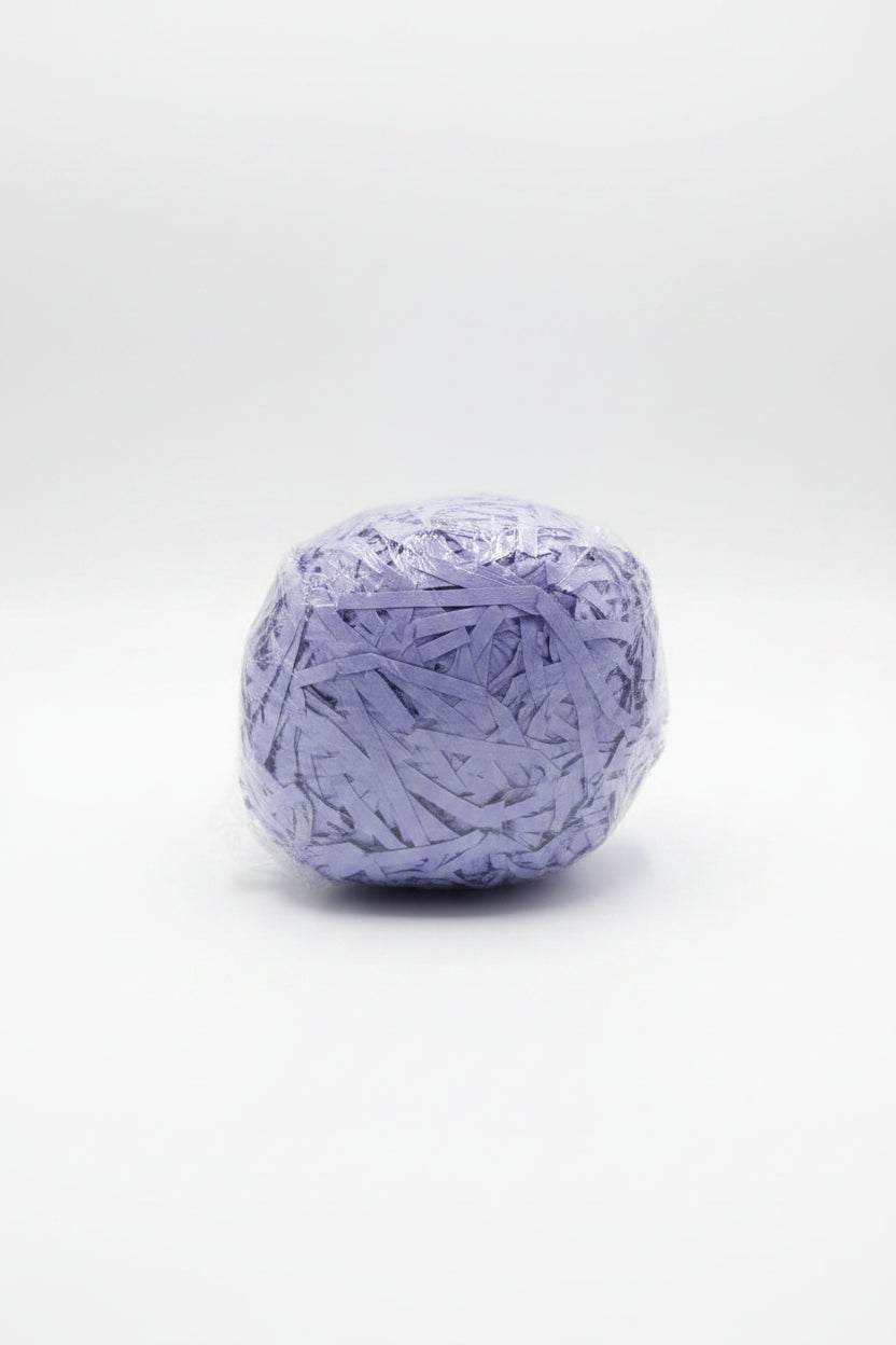Lavender periwinkle shredded paper gift box filler in a clear bag