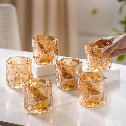 Single amber crinkle glass candle jar, lifestyle editorial shot