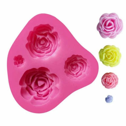 Pink four-cavity rose flower mould with example finished flowers in assorted sizes