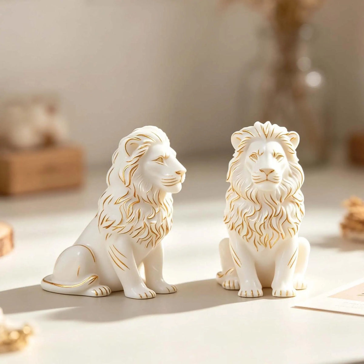 Side and front views of decorated seated lion sample castings; finished pieces not included