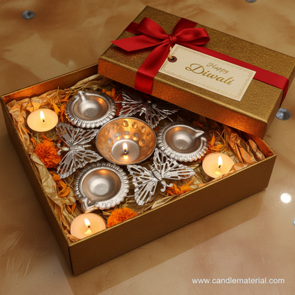 Silver butterfly diya set in luxury Diwali gift box with gold tissue and red ribbon