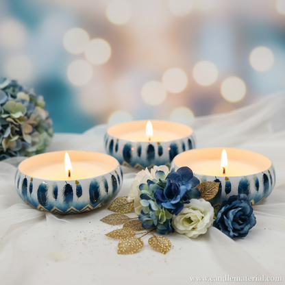 Three blue feather candle bowls as luxury gift set with blue and white flowers