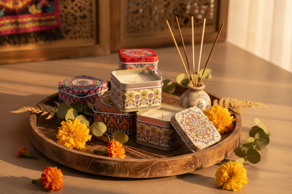 Square mandala candle tins festive gift set on wooden tray with marigolds