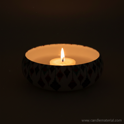 Moroccan lantern candle bowl with lit candle, dark moody background