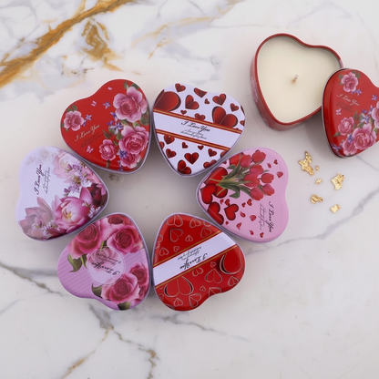 Heart candle tins flat lay on white marble with gold leaf accents