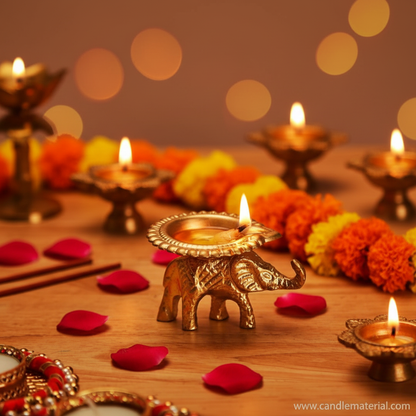 Brass elephant diya in festive Diwali setup with marigold garlands and diyas