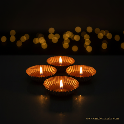 Copper gold diya bowls with lit candles, dark moody background with bokeh