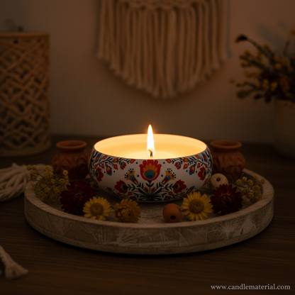 Folk floral candle bowl in cozy boho home interior with terracotta accents