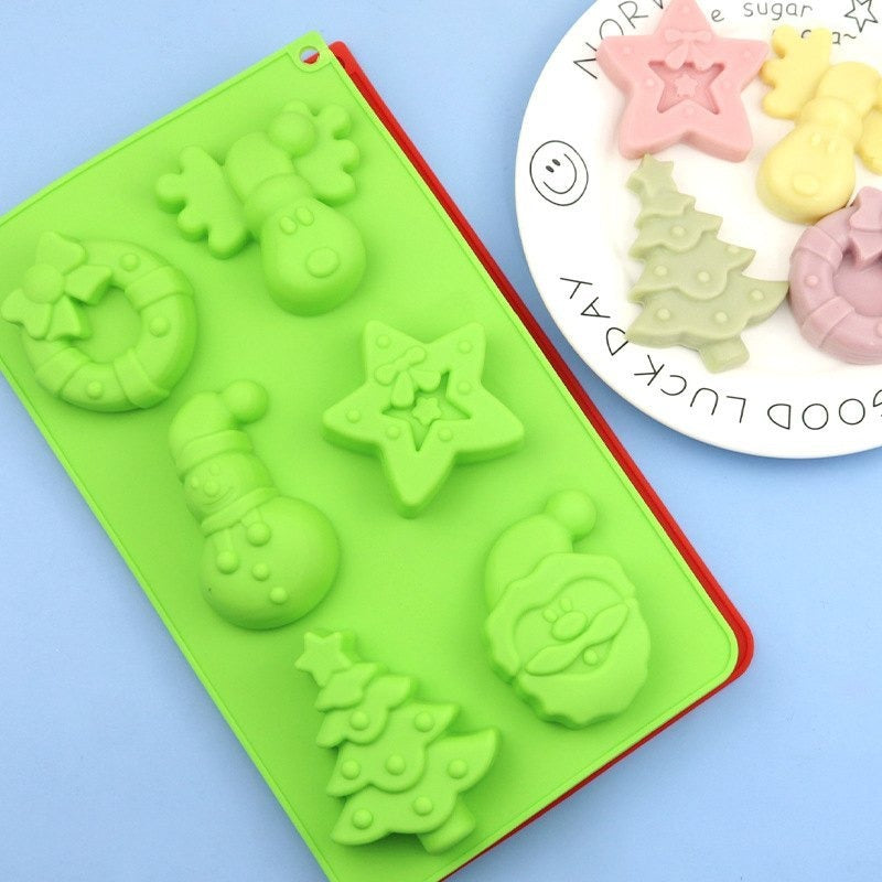 Santa, tree, snowman silicone cookie ice-cream mould for festive candles