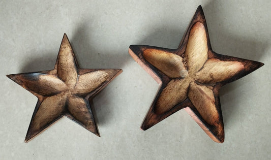 Wooden star-shaped vessel for handmade candles and festive decor