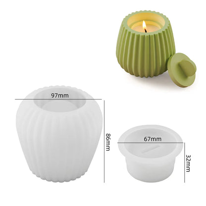 Ribbed candle jar mould showing finished candles in cream and green with matching lids