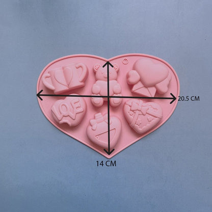 Six white wax melts cast from Valentine love heart silicone mould showing all 6 cavity designs
