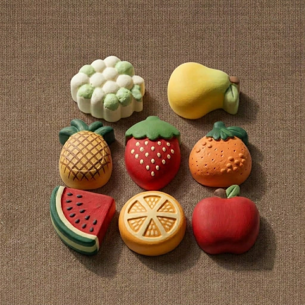 Colourful wax melts in fruit shapes including watermelon, strawberry, pineapple and apple